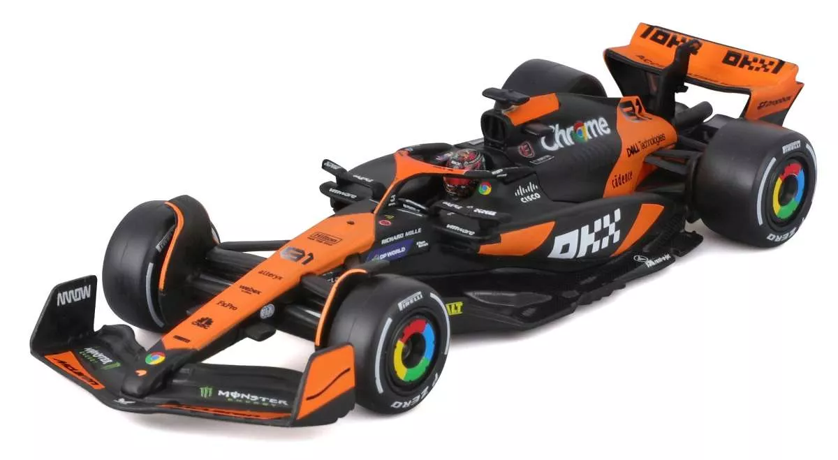 Burago 1838215-81 1:43 McLaren38 Gp Miami 2024 O.Piastri. Boîtier type vitrine