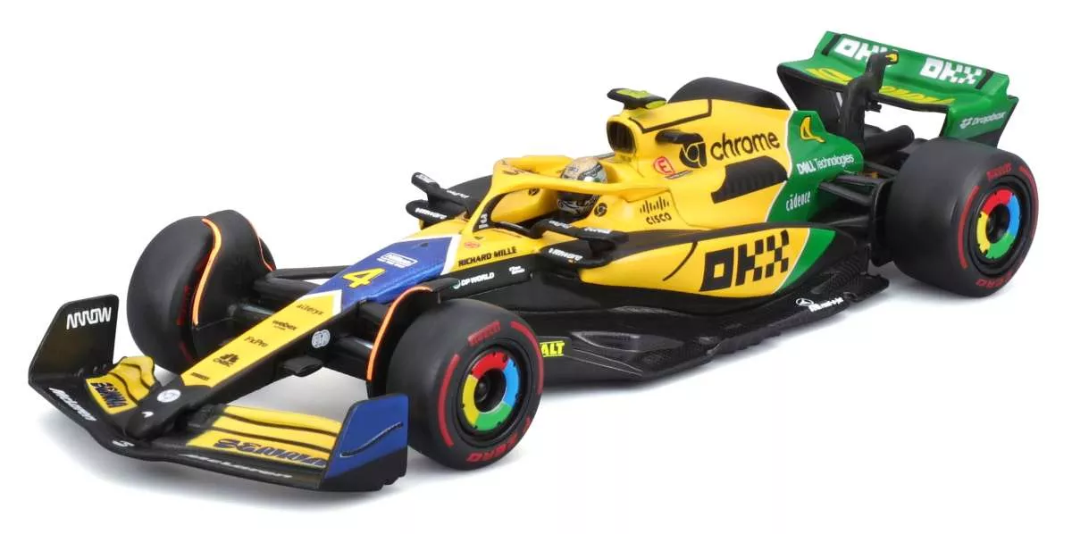 Burago 1838215-4SE 1:43 McLaren38 Gp Monaco 2024 L. Noris. Boîtier type vitrine